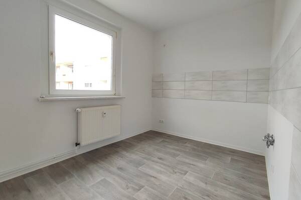 Hier wohnen Sie ruhig und doch zentral - Moderne Familienwohnung mit heller Wohnküche