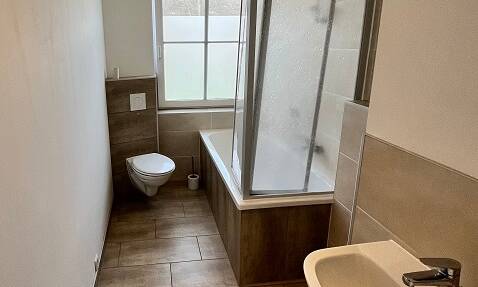 Ideal für eine kleine Familie - Idyllisch gelegene Wohnung in grüner Lage mit Gartenanteil und Garage
